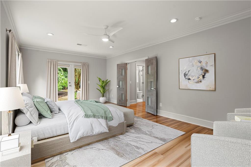 1200 Bay Pointe Terrace Alpharetta, GA 30005 - Photo 41 of 56 a bedroom with a large bed couch and window