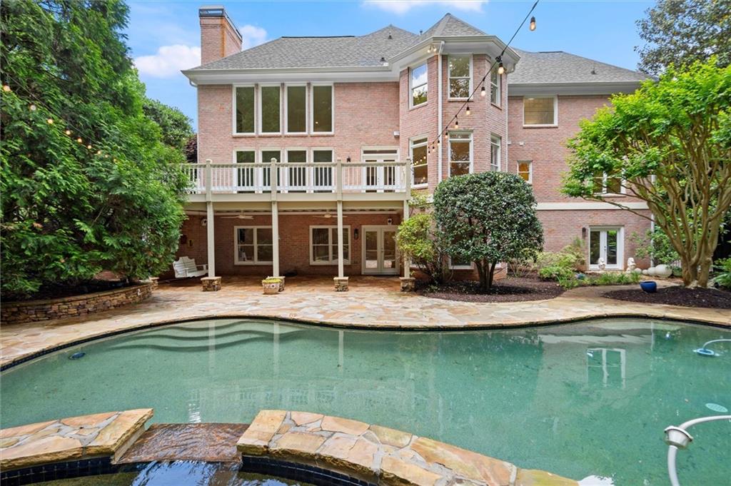 1200 Bay Pointe Terrace Alpharetta, GA 30005 - Photo 45 of 56 a front view of a house with swimming pool
