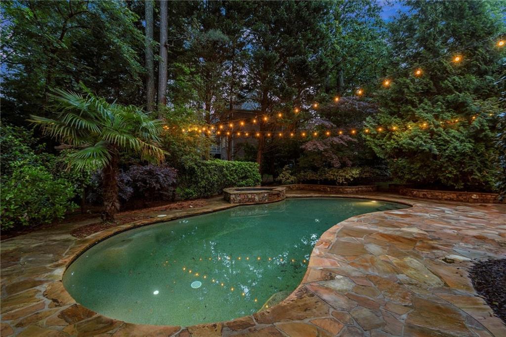 1200 Bay Pointe Terrace Alpharetta, GA 30005 - Photo 49 of 56 a view of a swimming pool with a yard