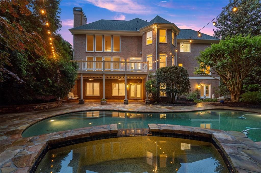 1200 Bay Pointe Terrace Alpharetta, GA 30005 - Photo 50 of 56 a front view of a house with swimming pool