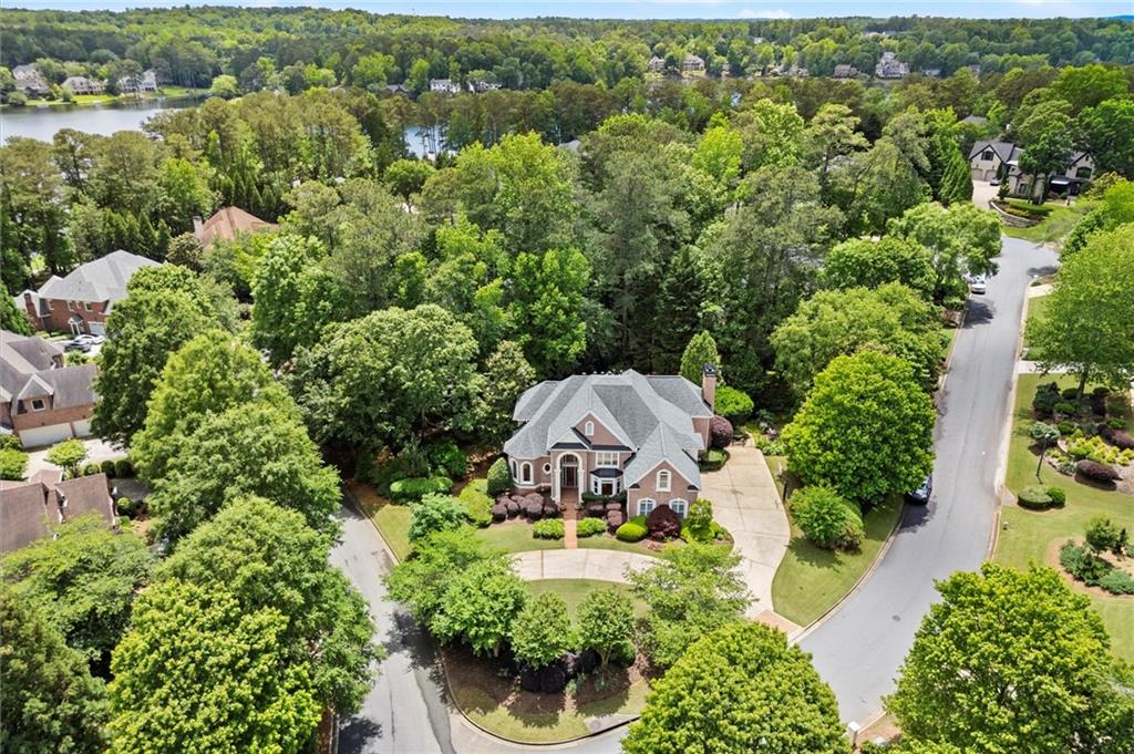 1200 Bay Pointe Terrace Alpharetta, GA 30005 - Photo 51 of 56 an aerial view of a house with yard swimming pool outdoor seating and yard