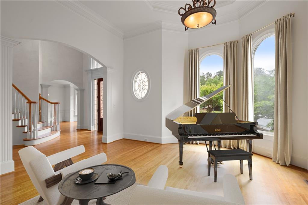 1200 Bay Pointe Terrace Alpharetta, GA 30005 - Photo 6 of 56 a living room with furniture and a wooden floor