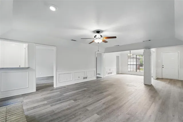 a kitchen with stainless steel appliances a refrigerator sink and stove