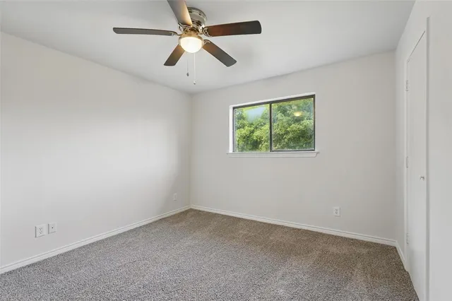 a bathroom with a granite countertop sink mirror and double