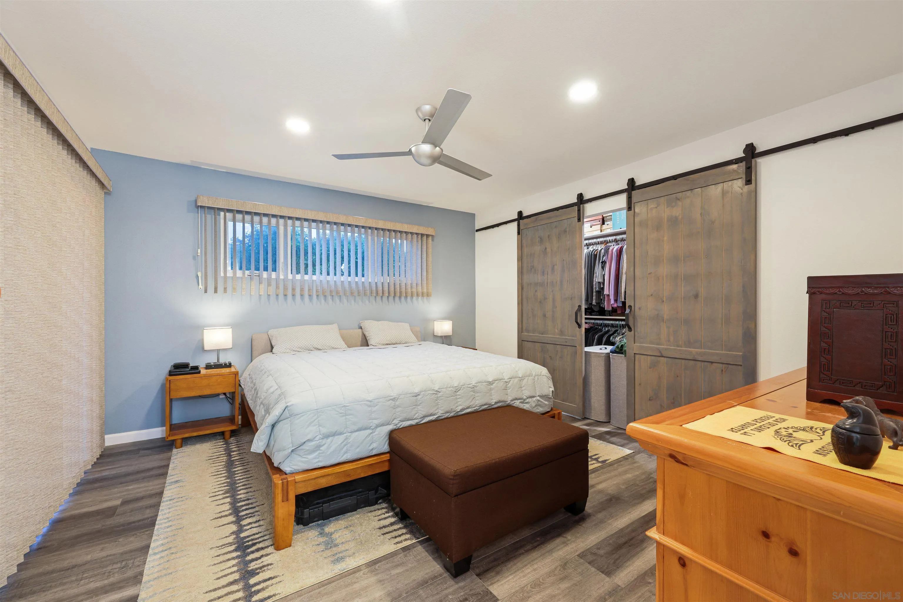 4016 Via Rio Avenue Oceanside, CA 92057 - Photo 16 of 34 a bedroom with a bed and a flat screen tv