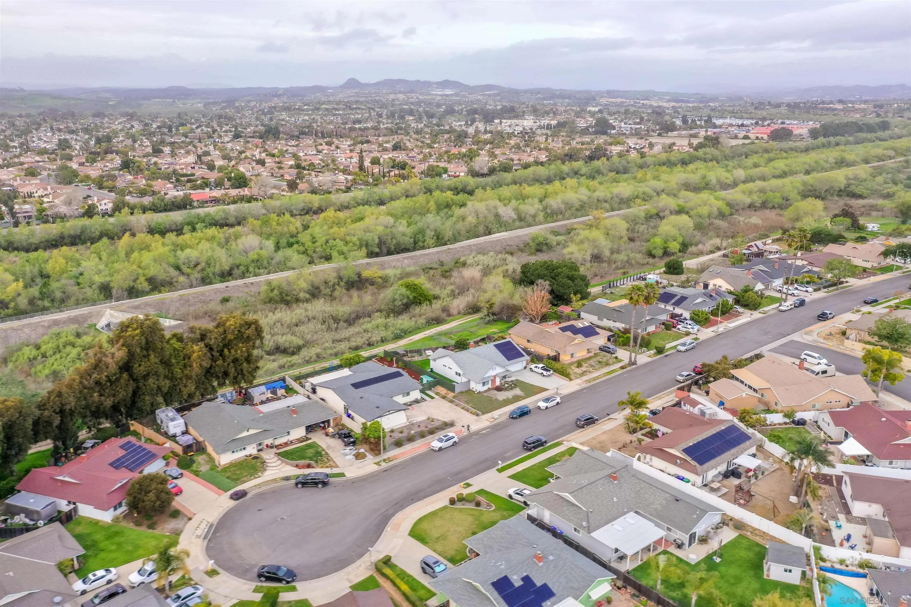 4016 Via Rio Avenue Oceanside, CA 92057 - Photo 33 of 34 an aerial view of a city and mountain view in back