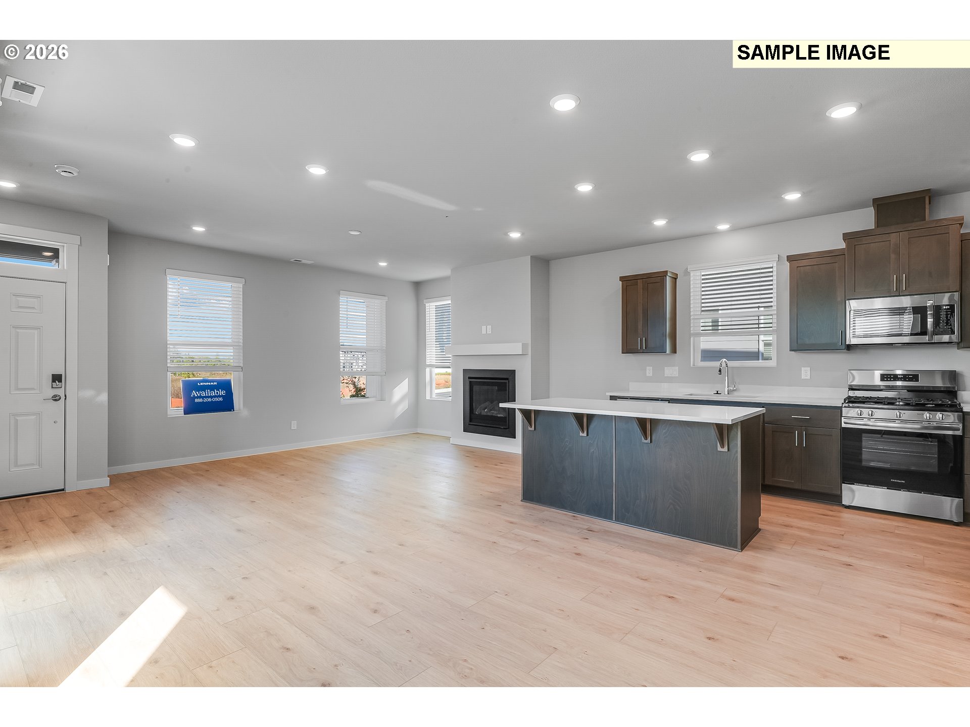 1092 Legacy Street Eugene, OR 97402 - Photo 5 of 20 a large kitchen with stainless steel appliances granite countertop a large counter top a stove a sink and a refrigerator