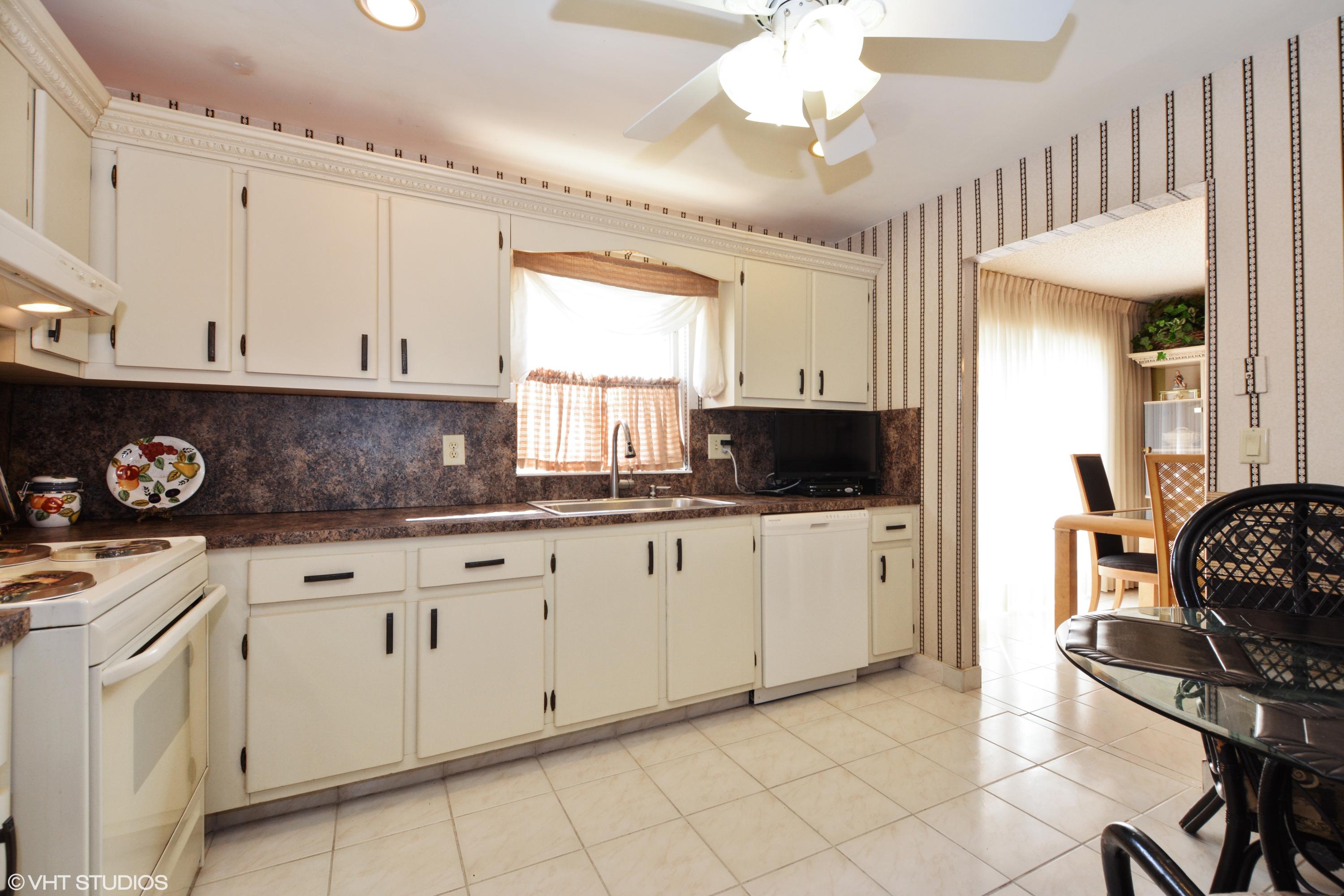 6098 Lasalle Road Delray Beach, FL 33484 - Photo 3 of 16 03_6098LaSalleRd_5_Kitchen_HiRes