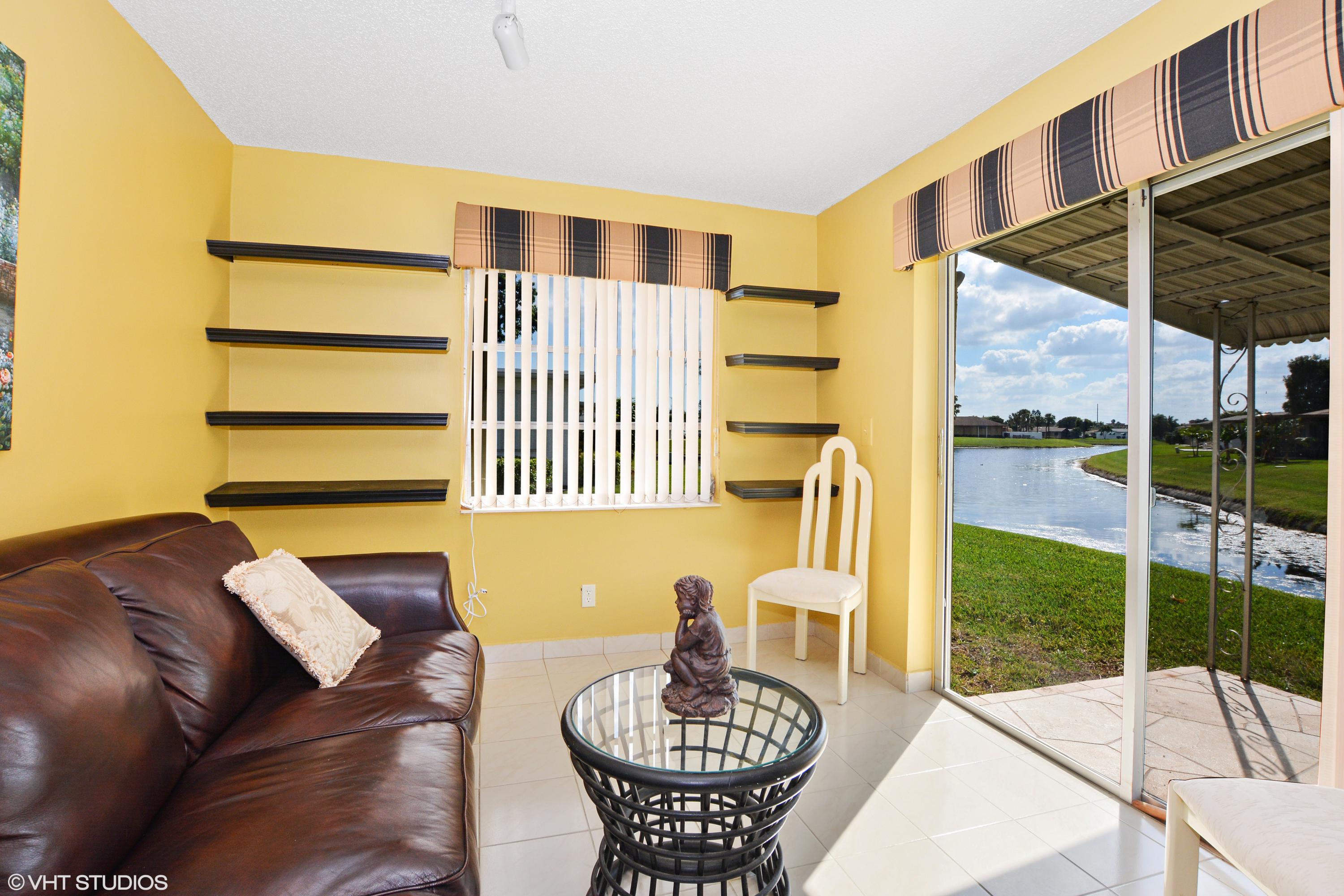 6098 Lasalle Road Delray Beach, FL 33484 - Photo 6 of 16 06_6098LaSalleRd_3_FamilyRoom_HiRes