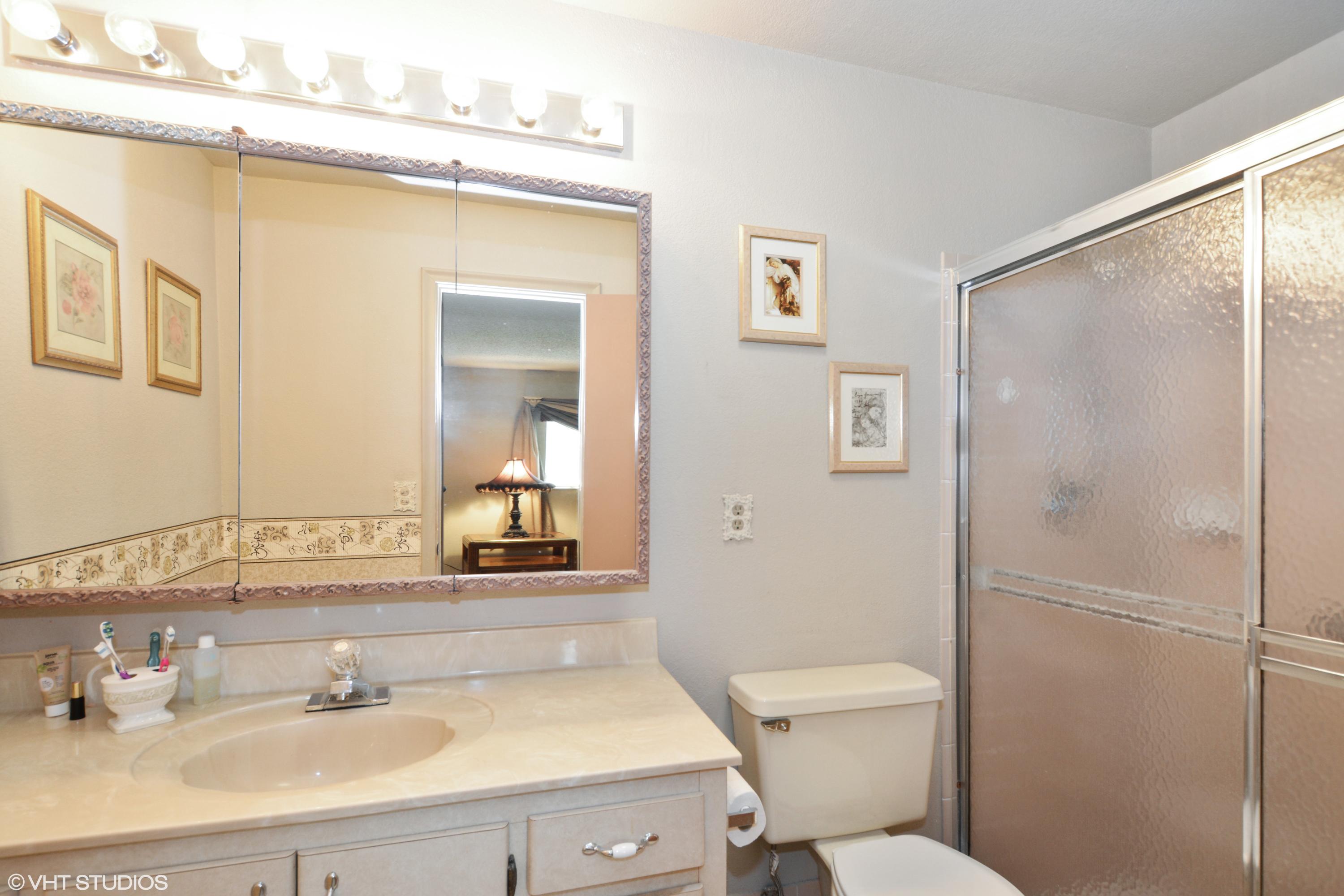 6098 Lasalle Road Delray Beach, FL 33484 - Photo 8 of 16 08_6098LaSalleRd_13_MasterBathroom_HiRes