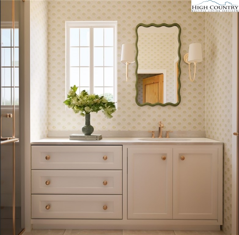 The Raynor Condos, Unit 2D Blowing Rock, NC 28605 - Photo 12 of 22 a bathroom with a sink and a mirror
