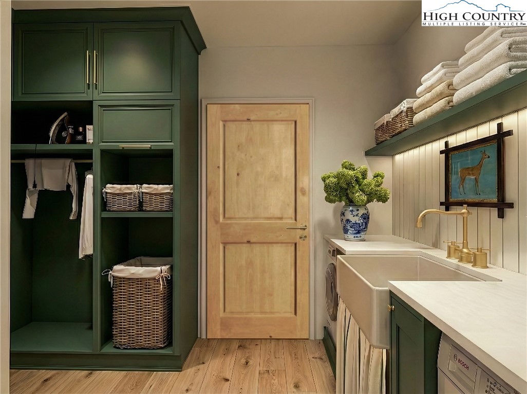 The Raynor Condos, Unit 2D Blowing Rock, NC 28605 - Photo 18 of 22 a bathroom with a sink and a mirror