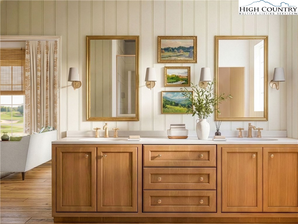 The Raynor Condos, Unit 2D Blowing Rock, NC 28605 - Photo 10 of 22 a bathroom with double vanity and a mirror