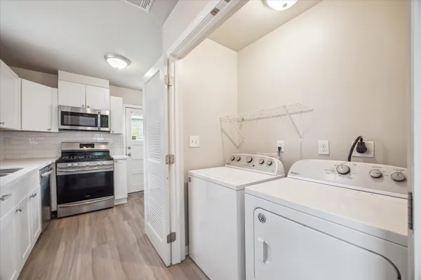 a view of kitchen and washer and dryer