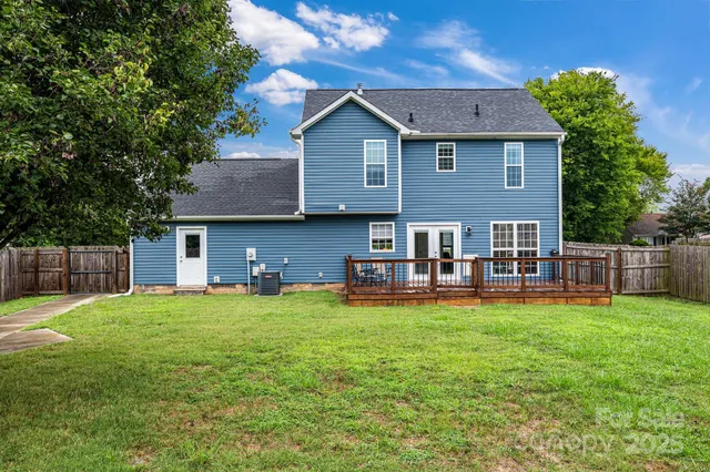 a view of backyard with green space