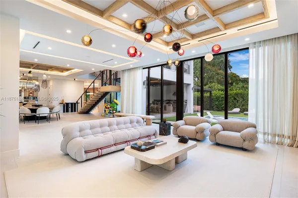 a view of entryway and hall with dining room