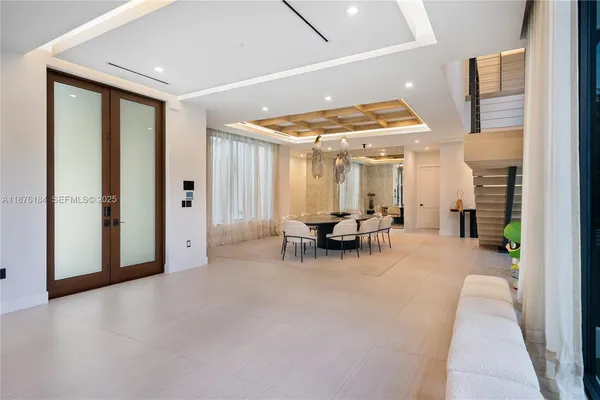 a living room with furniture fireplace and flat screen tv