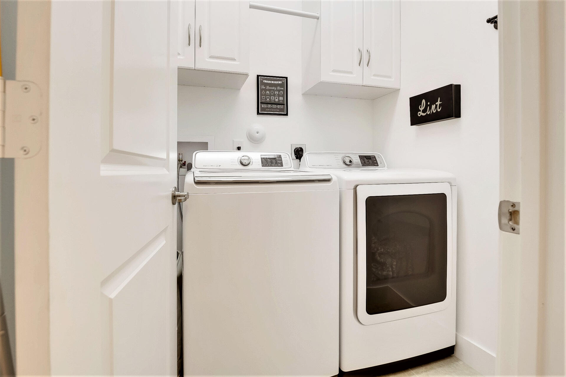 6016 Pine Tree Way Riviera Beach, FL 33410 - Photo 29 of 45 Laundry Room on 2nd floor