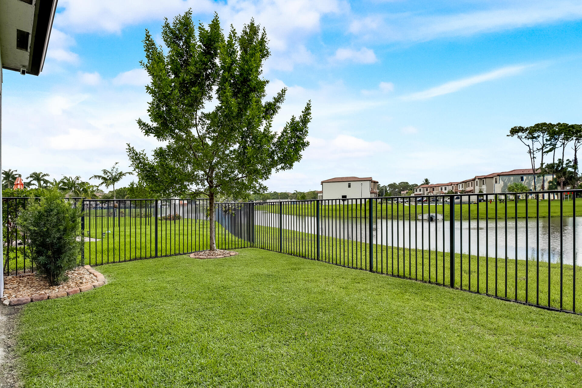 6016 Pine Tree Way Riviera Beach, FL 33410 - Photo 35 of 45 Fabulous lake view