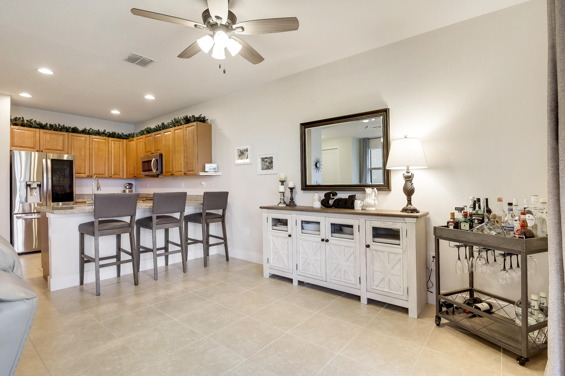 6016 Pine Tree Way Riviera Beach, FL 33410 - Photo 5 of 45 Great Room looking into kitchen