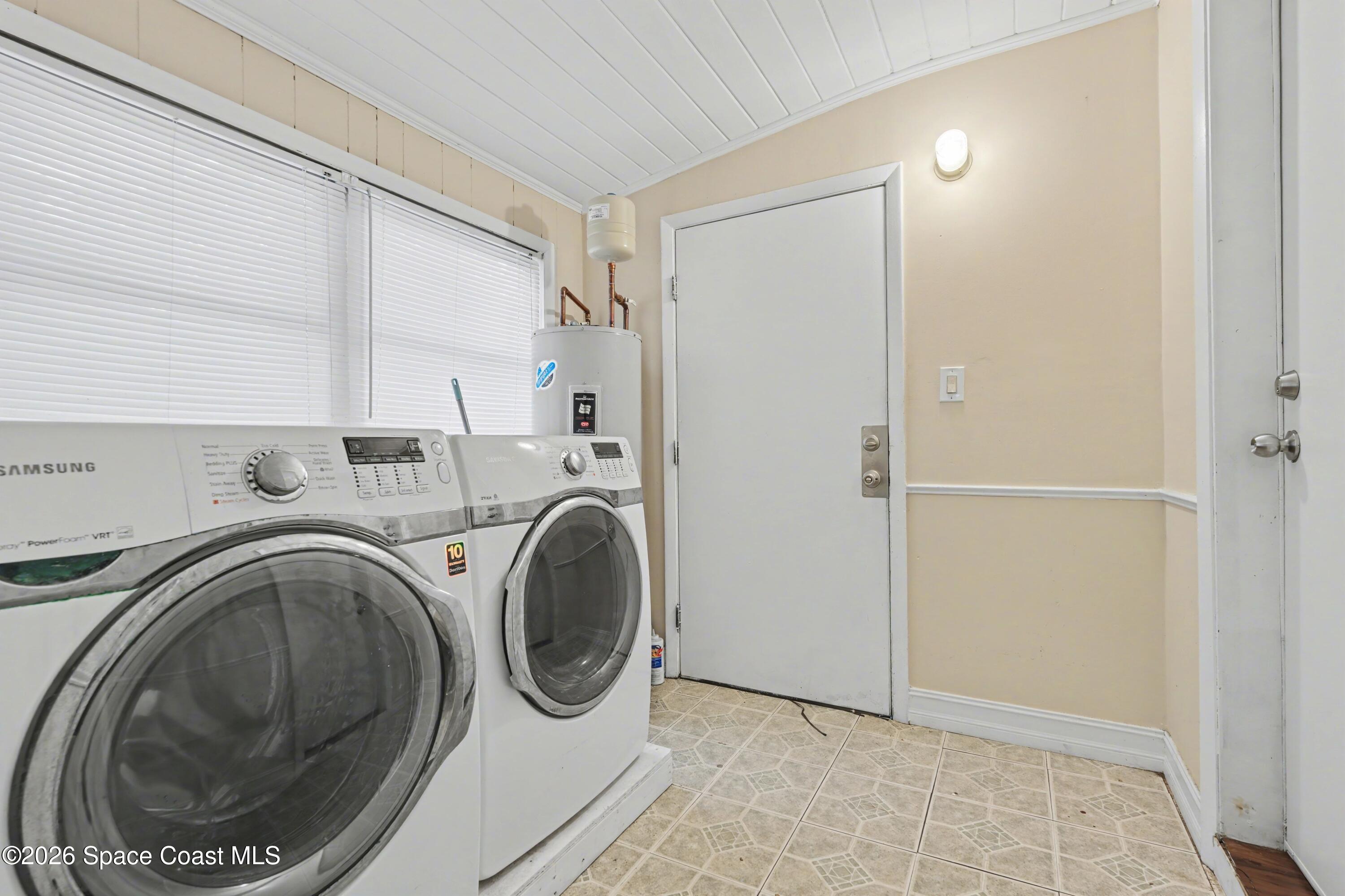 1708 Pine Street, Unit 2 Melbourne, FL 32901 - Photo 16 of 21 a utility room with dryer and washer