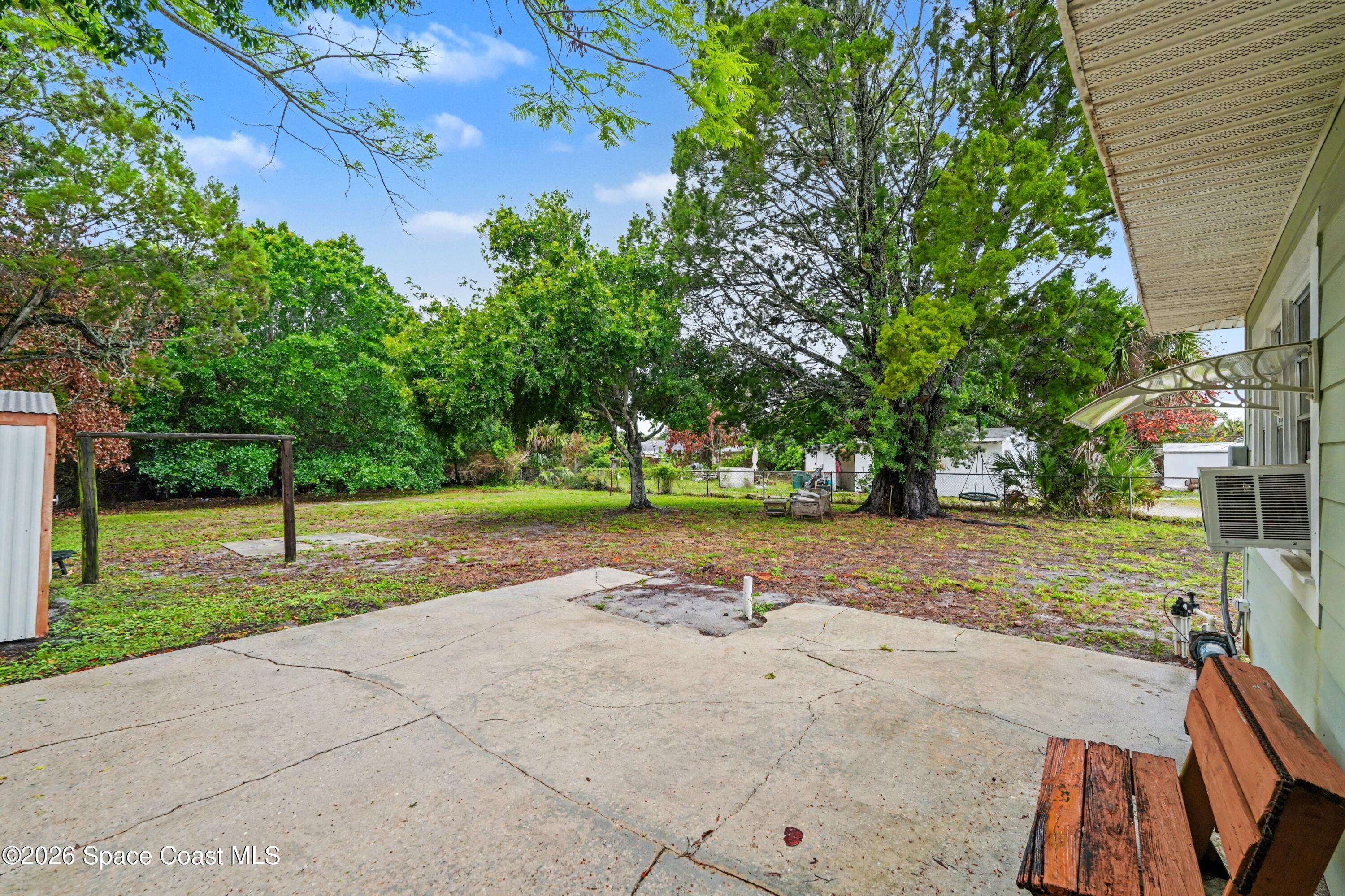 1708 Pine Street, Unit 2 Melbourne, FL 32901 - Photo 18 of 21 a view of a park with tree s