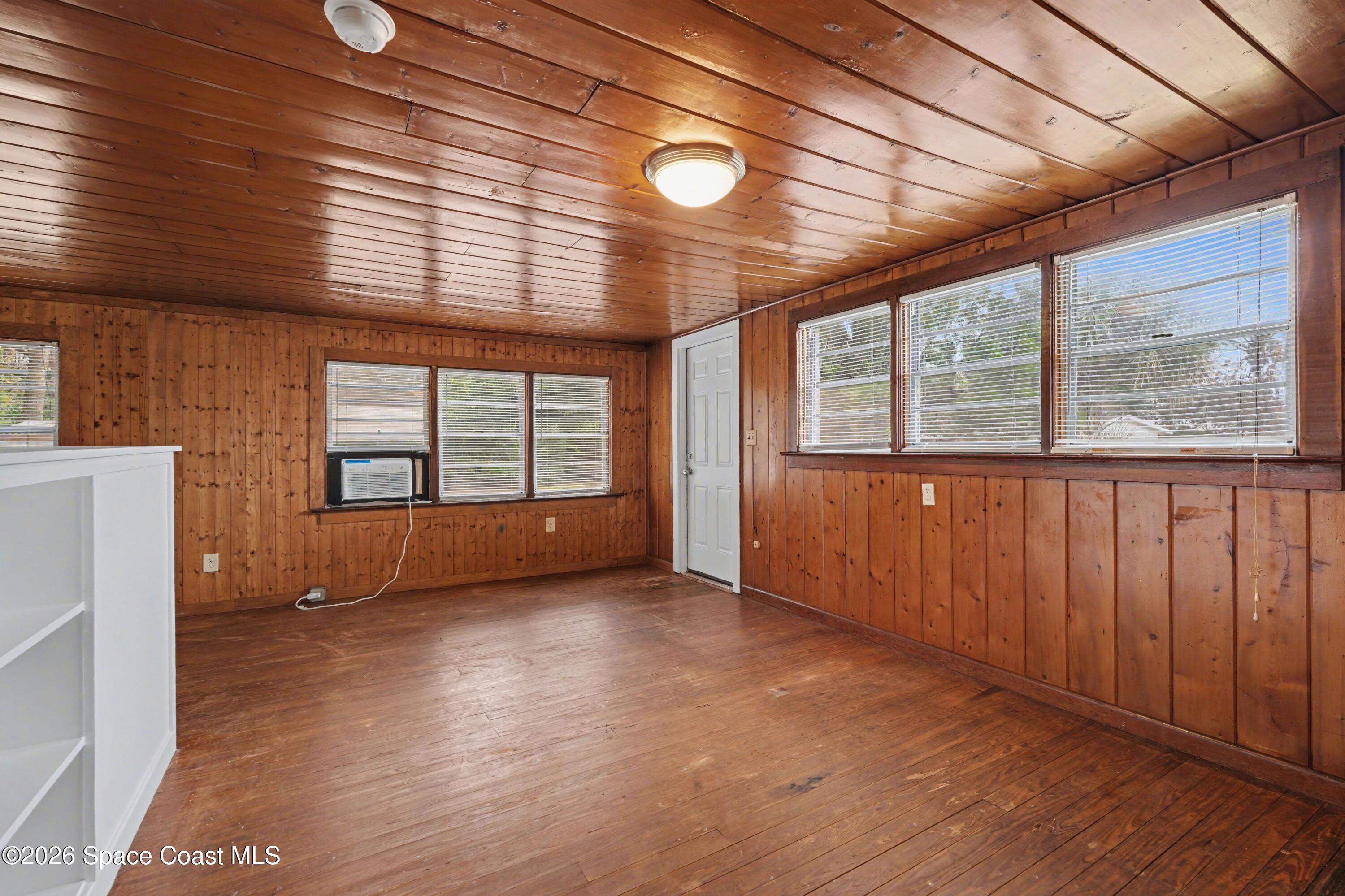 1708 Pine Street, Unit 2 Melbourne, FL 32901 - Photo 7 of 21 a view of an empty room with a window