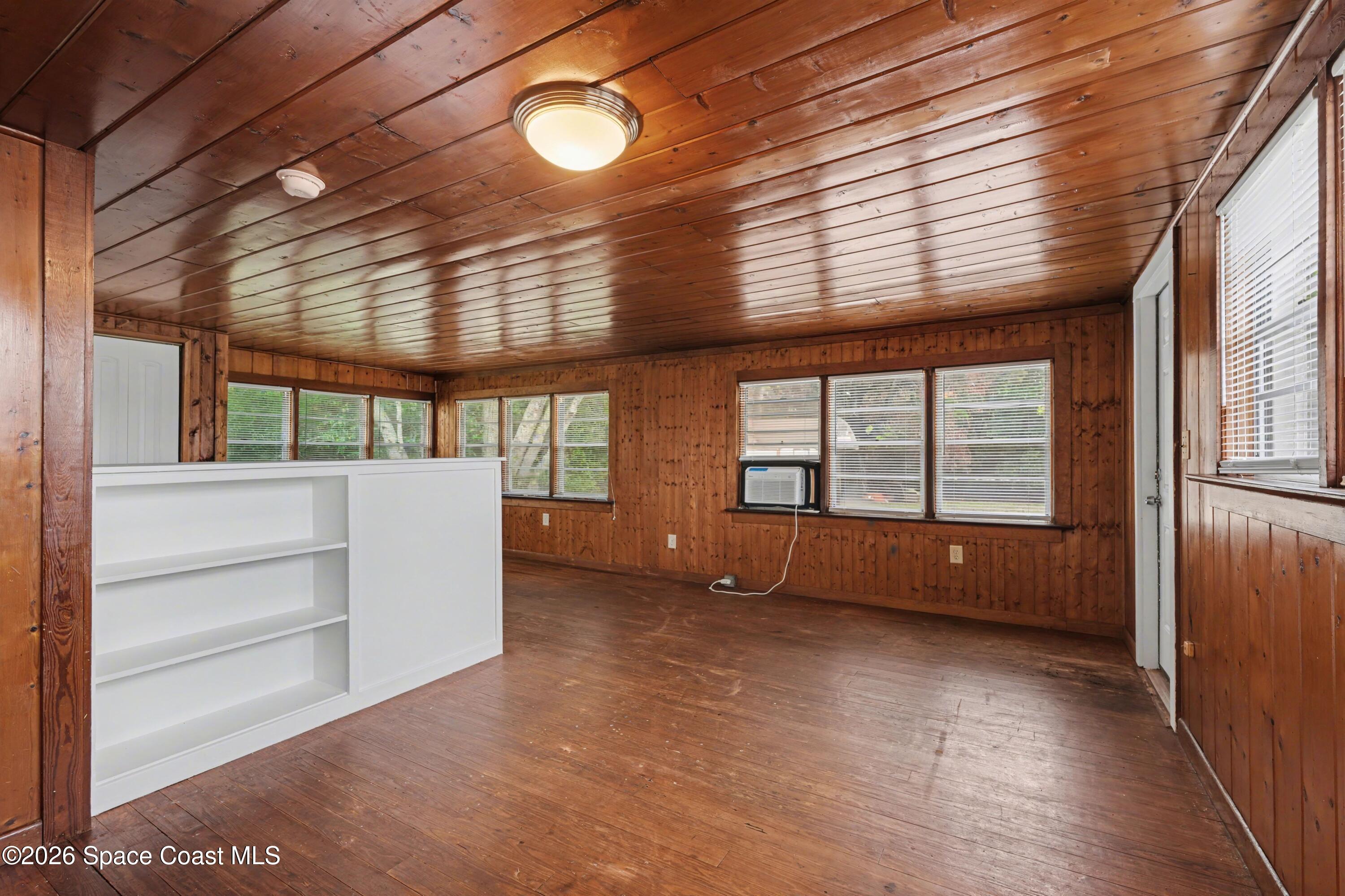 1708 Pine Street, Unit 2 Melbourne, FL 32901 - Photo 8 of 21 a view of an empty room with a window