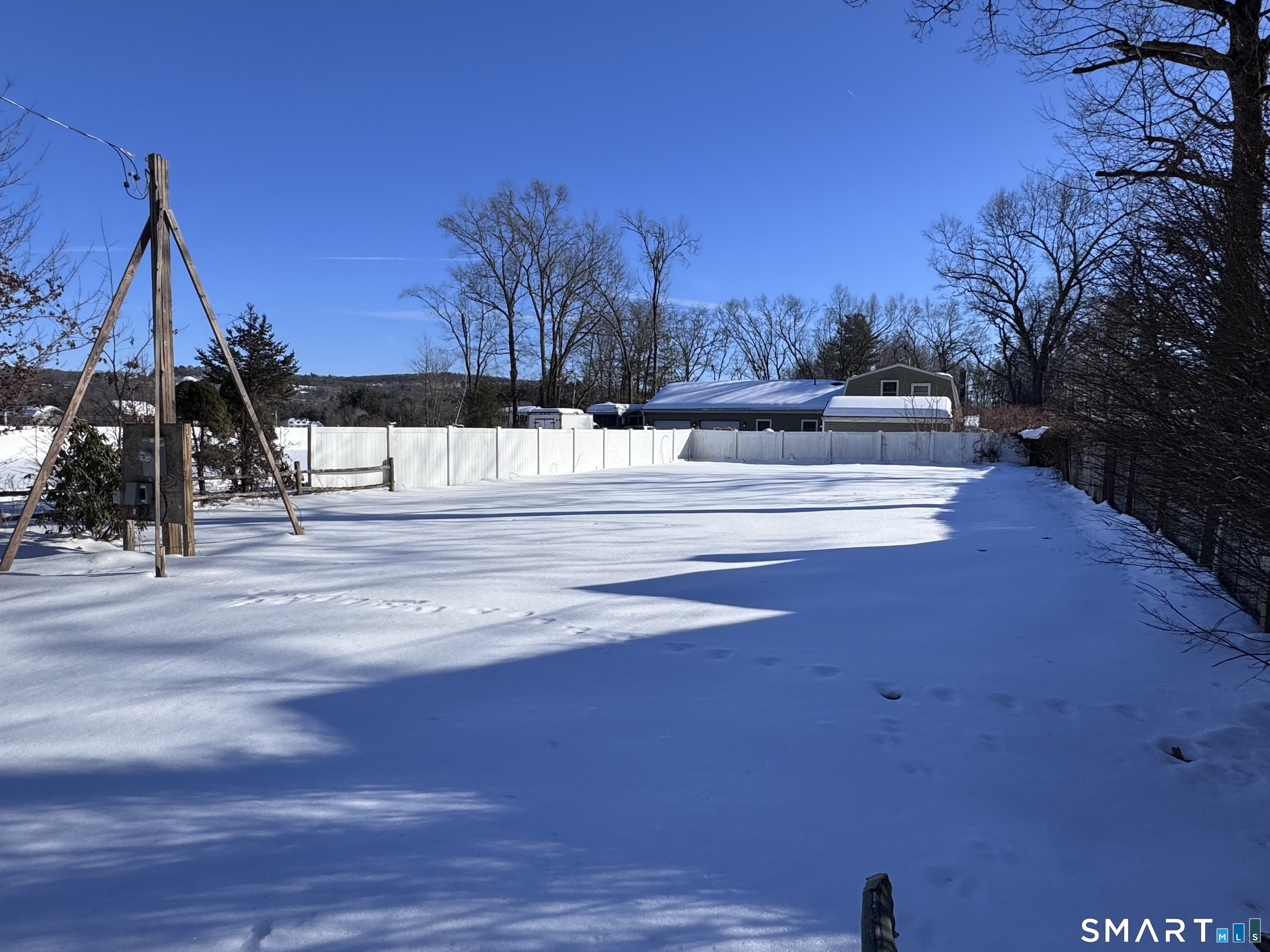 187 Griffin Road Suffield, CT 06093 - Photo 1 of 2 a view of a walk in the middle of a yard