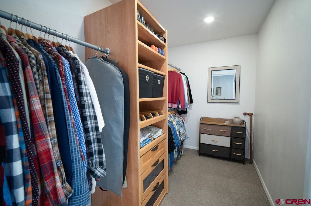 35111 Rd K.1 Mancos, CO 81328 - Photo 25 of 35 a view of walk in closet with clothes and shoes