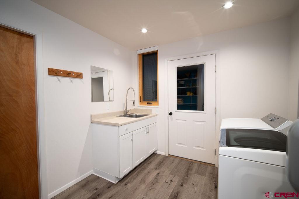 35111 Rd K.1 Mancos, CO 81328 - Photo 26 of 35 a bathroom with a sink a toilet and vanity