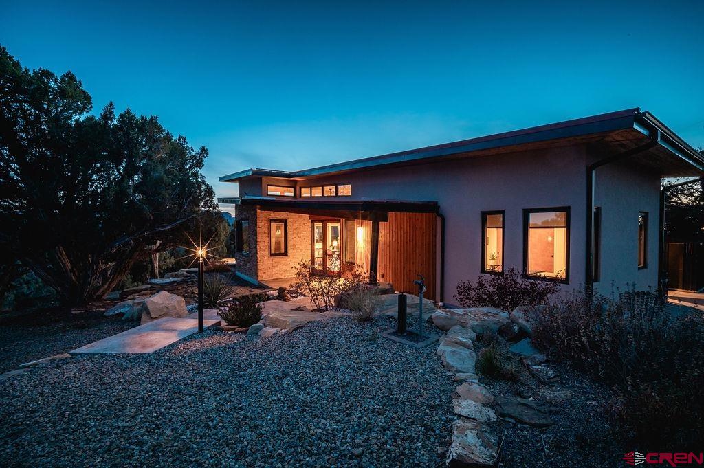 35111 Rd K.1 Mancos, CO 81328 - Photo 27 of 35 a view of house with yard and outdoor seating