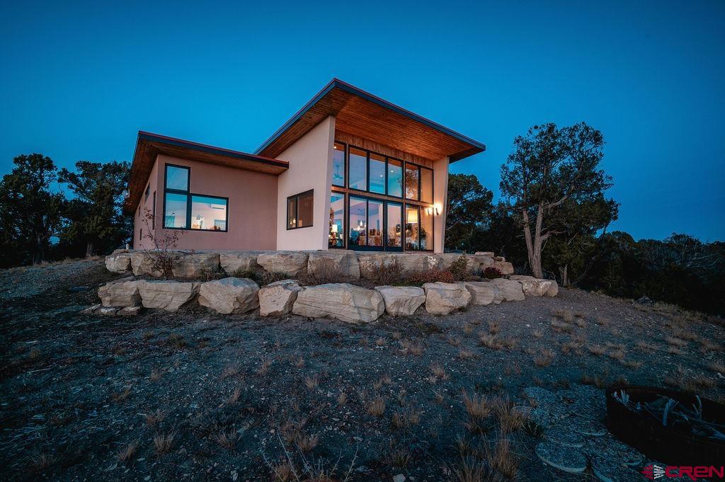 35111 Rd K.1 Mancos, CO 81328 - Photo 3 of 35 a view of a house with a backyard and sitting area