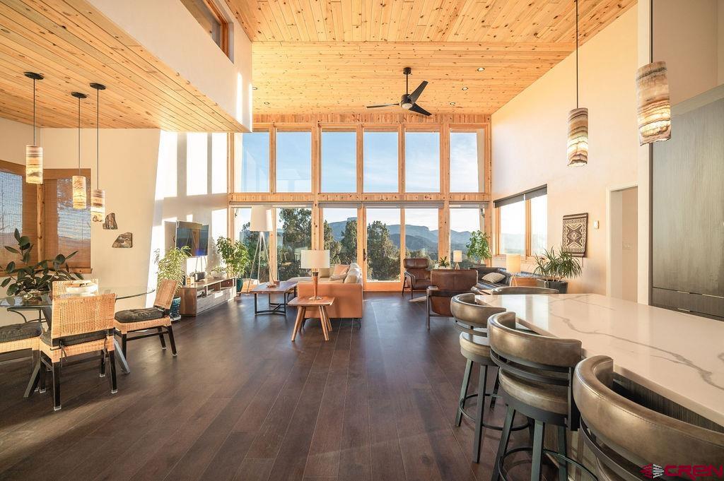 35111 Rd K.1 Mancos, CO 81328 - Photo 6 of 35 a living room with furniture and floor to ceiling windows