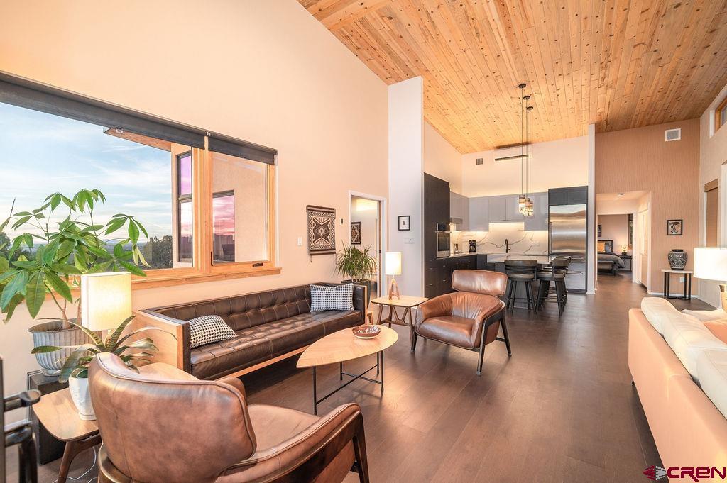 35111 Rd K.1 Mancos, CO 81328 - Photo 10 of 35 a living room with furniture and a floor to ceiling window