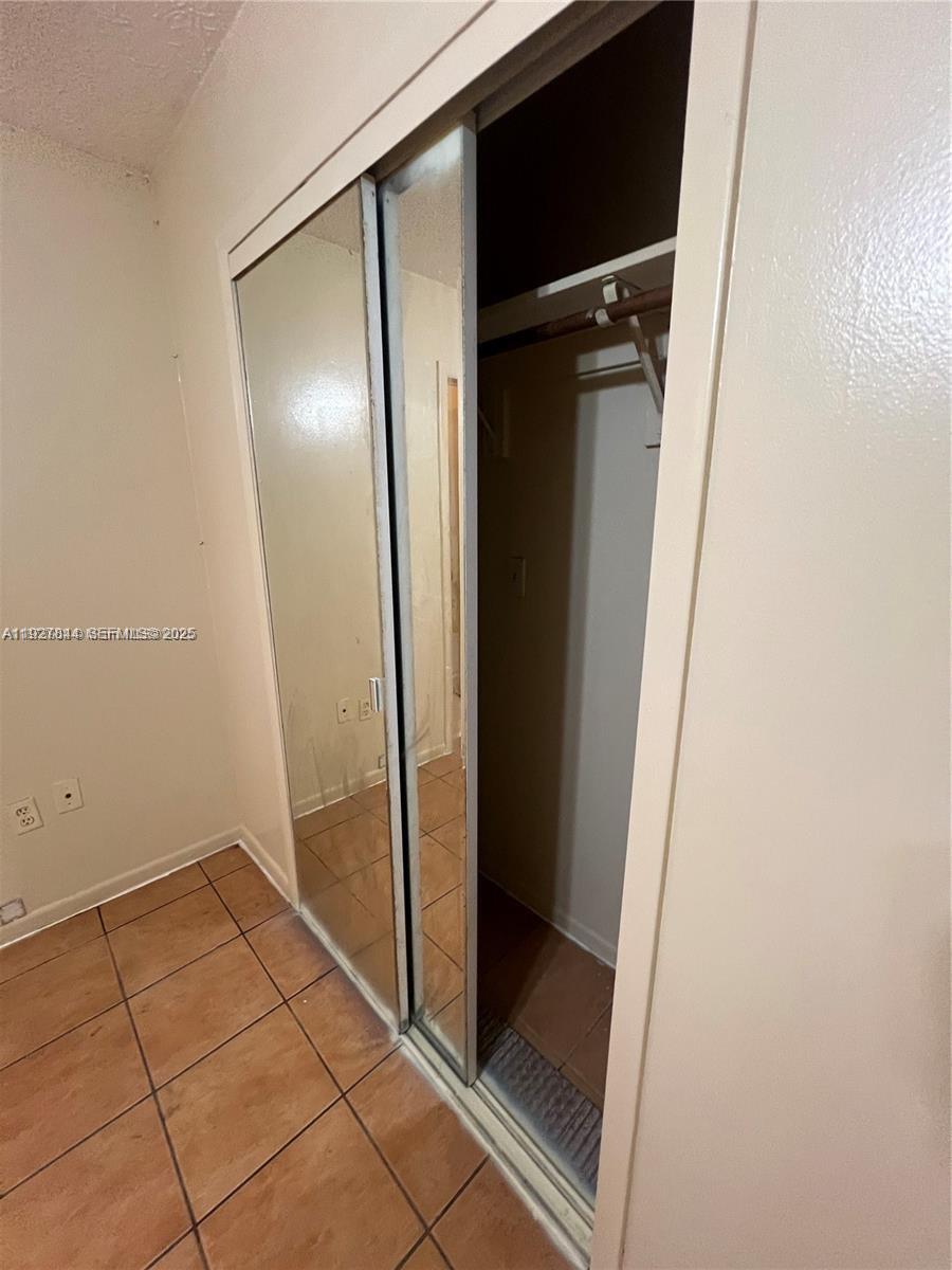 1581 Northeast 117th Street Miami, FL 33161 - Photo 11 of 29 a view of an empty room