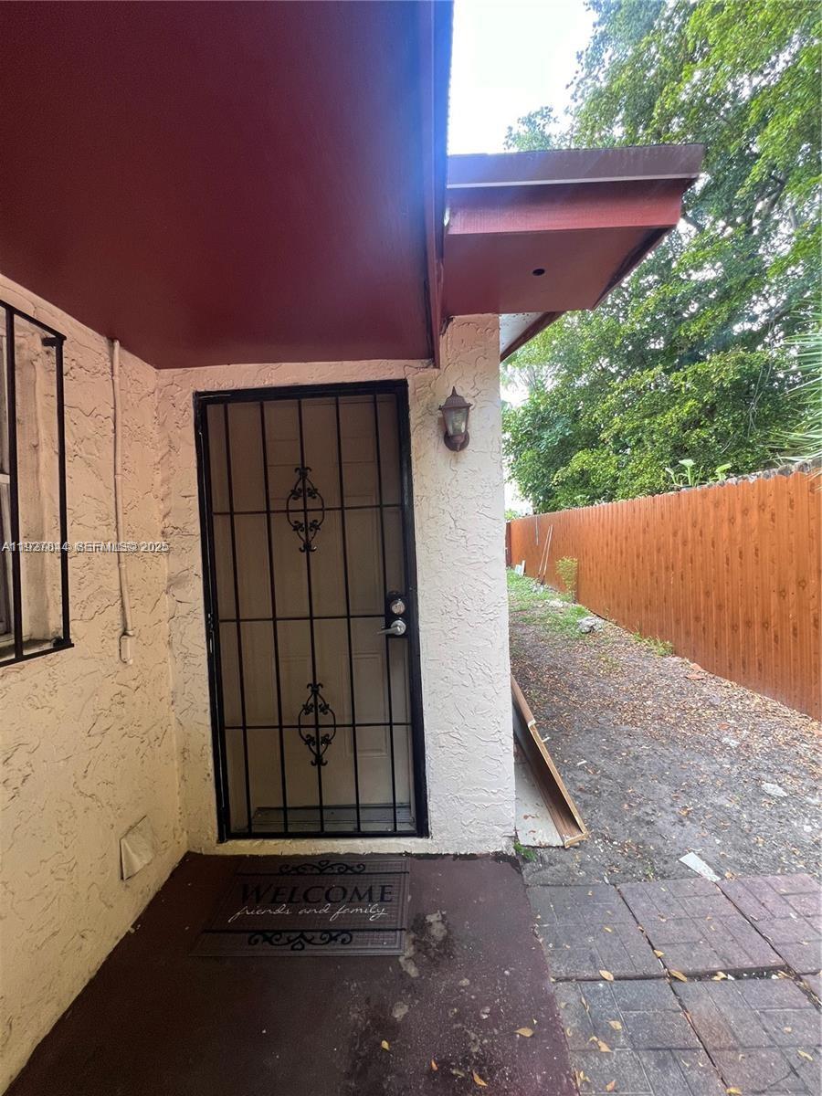 1581 Northeast 117th Street Miami, FL 33161 - Photo 16 of 29 a front view of a house with a garage