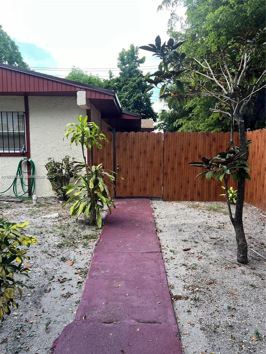 1581 Northeast 117th Street Miami, FL 33161 - Photo 3 of 29 a view of a backyard