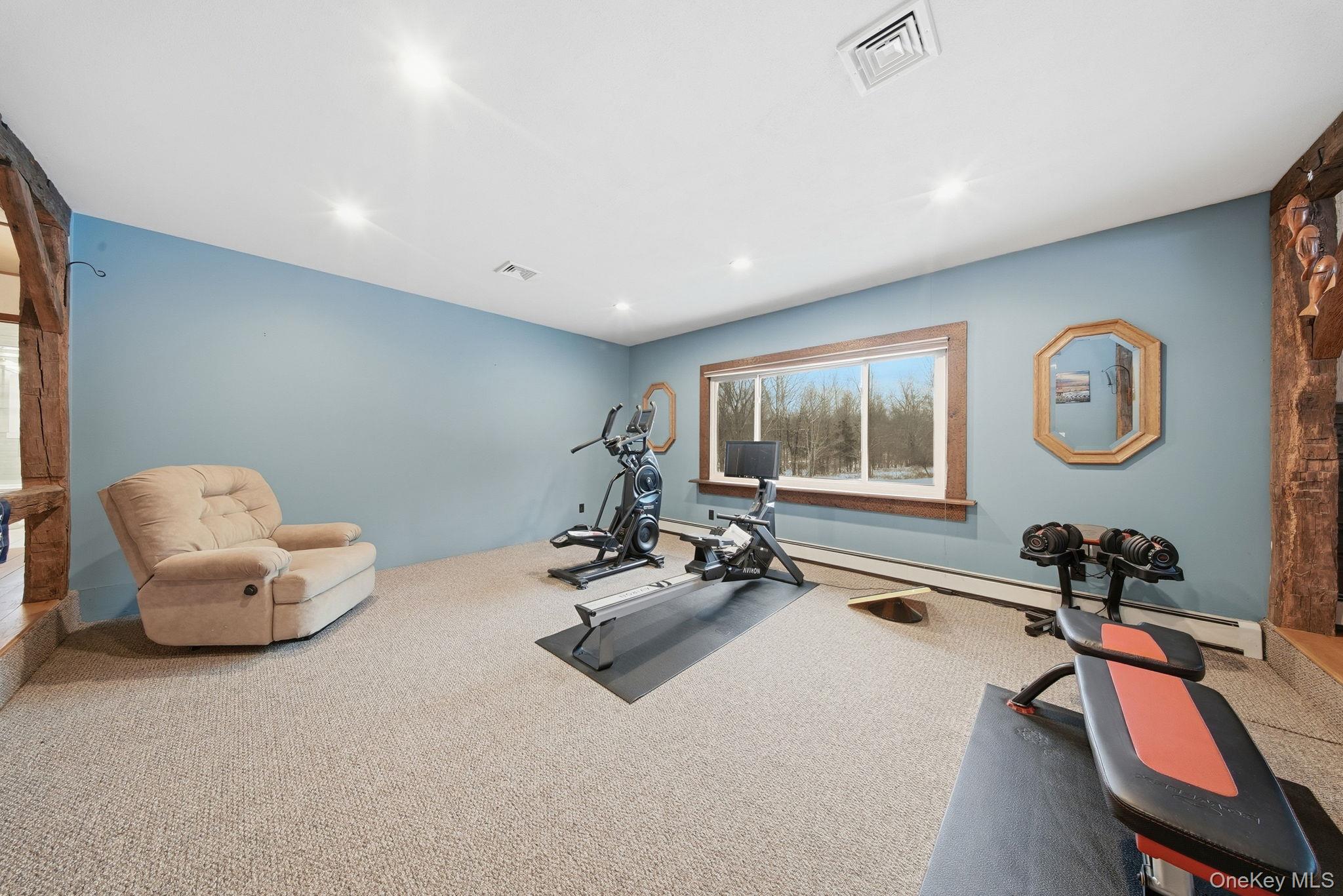 41 Low Road Wallkill, NY 12589 - Photo 13 of 37 Room featuring baseboard heating, recessed lighting, and carpet floors