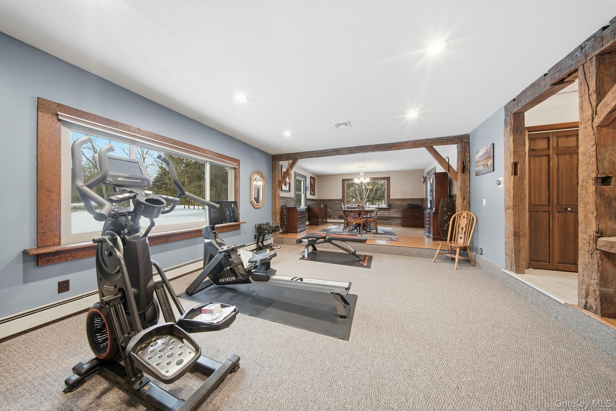 41 Low Road Wallkill, NY 12589 - Photo 15 of 37 Exercise area featuring recessed lighting, carpet flooring, and a chandelier