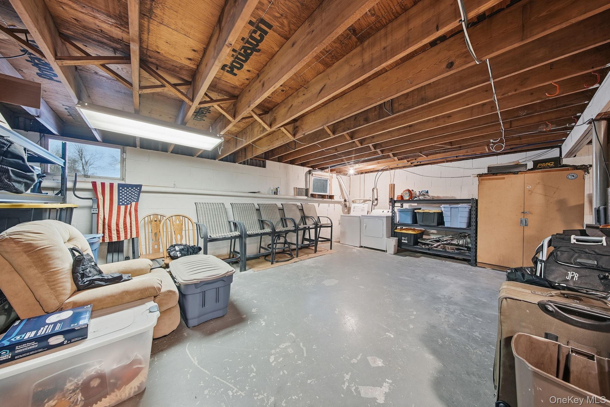 41 Low Road Wallkill, NY 12589 - Photo 27 of 37 Below grade area featuring washing machine and dryer