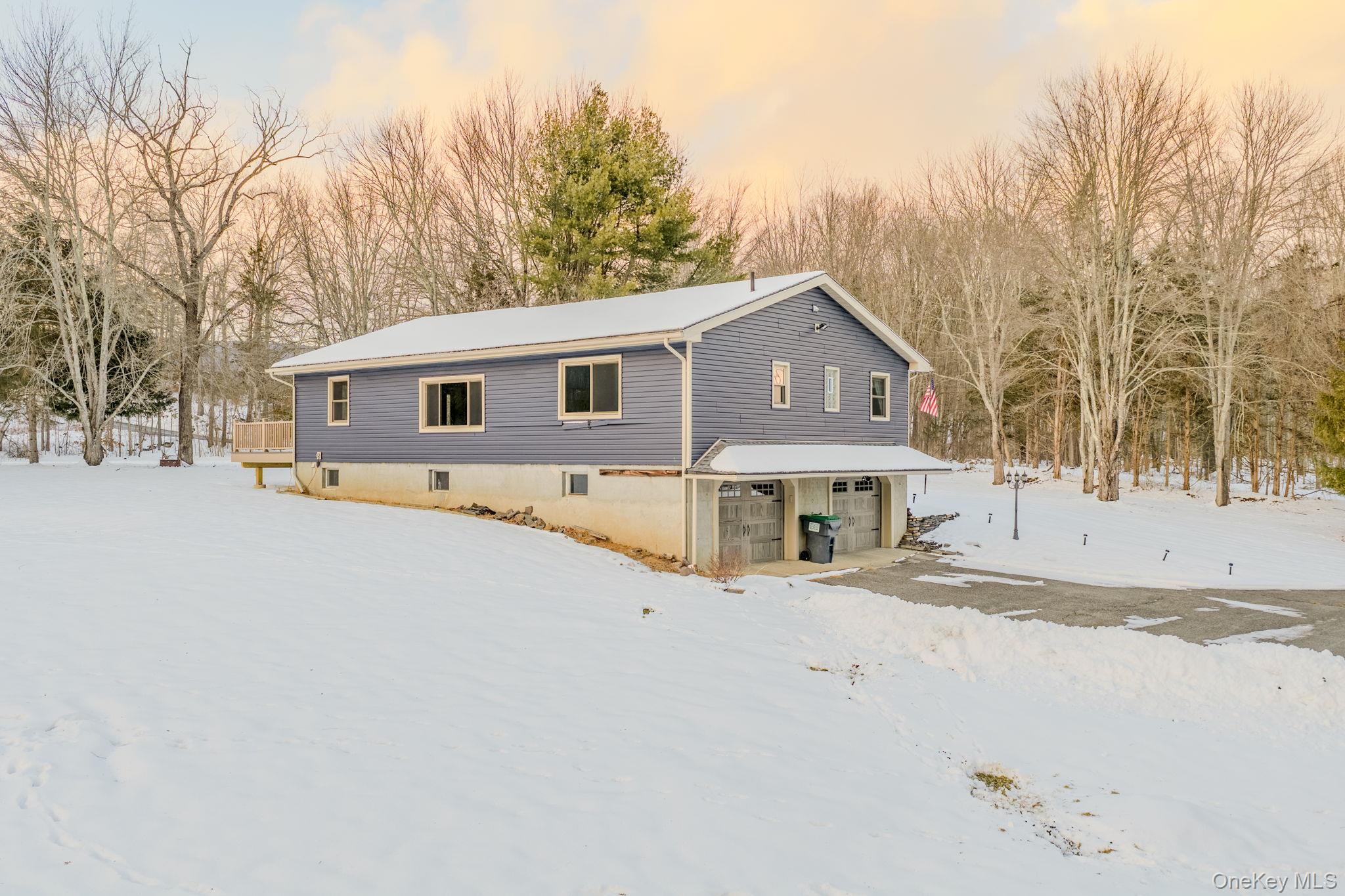41 Low Road Wallkill, NY 12589 - Photo 31 of 37 Snow covered property with a garage