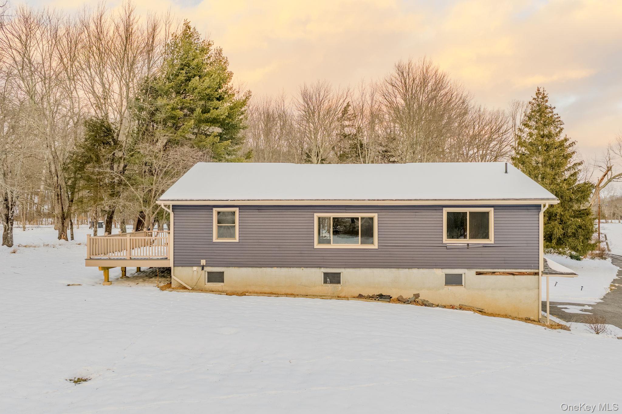 41 Low Road Wallkill, NY 12589 - Photo 32 of 37 Snow covered property with a wooden deck