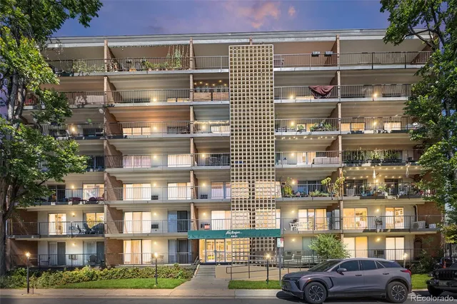 a cars parked in front of a building