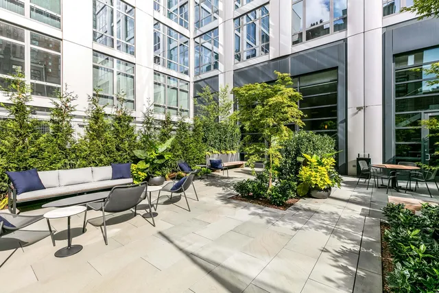 a view of a chairs and tables in the patio
