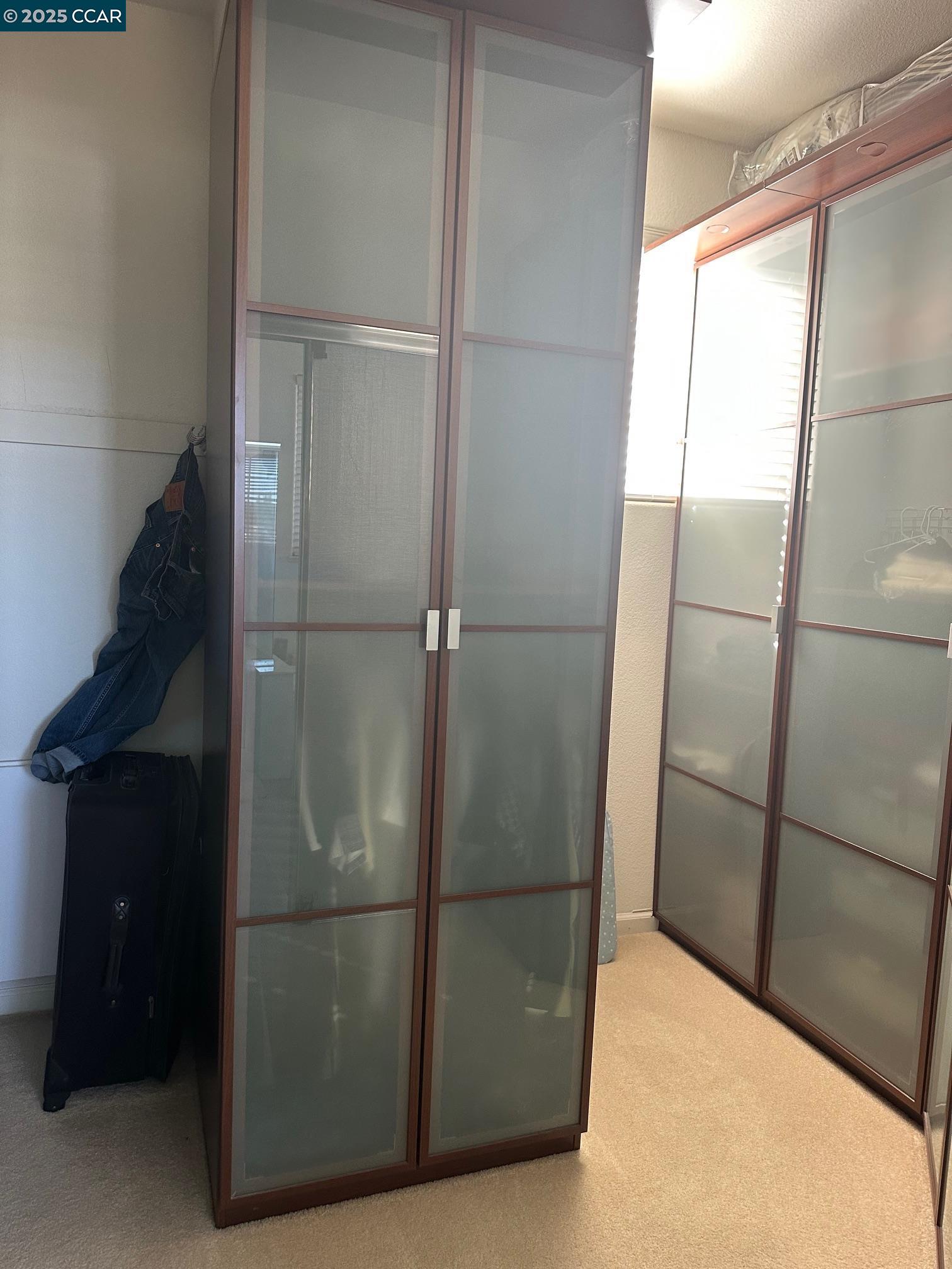 584 Silver Maple Drive Hercules, CA 94547 - Photo 17 of 19 a bathroom with a glass shower door