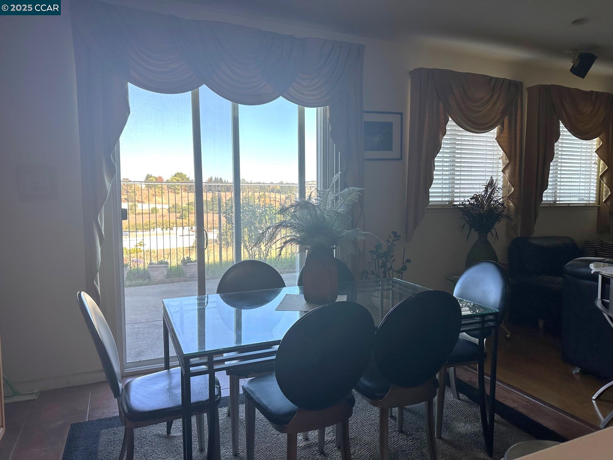 584 Silver Maple Drive Hercules, CA 94547 - Photo 8 of 19 a dining room with furniture and wooden floor