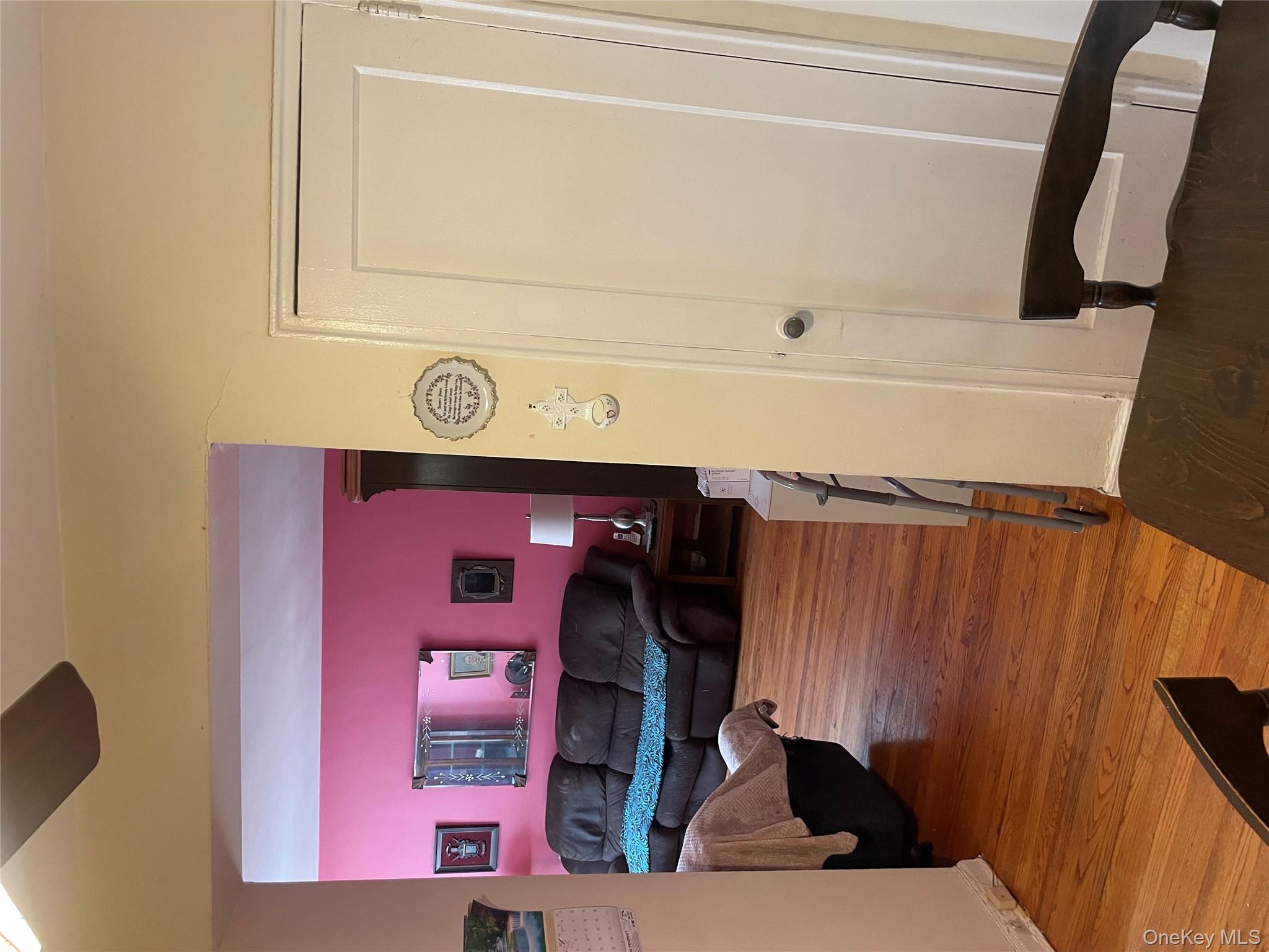 5614 Netherland Avenue, Unit 4A Bronx, NY 10471 - Photo 4 of 19 a view of a livingroom with furniture and staircase