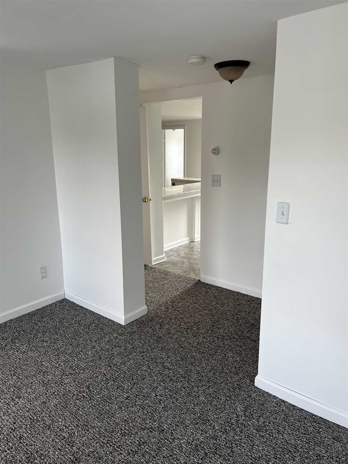 1 Dewindt Street Beacon, NY 12508 - Photo 5 of 12 an empty room with windows