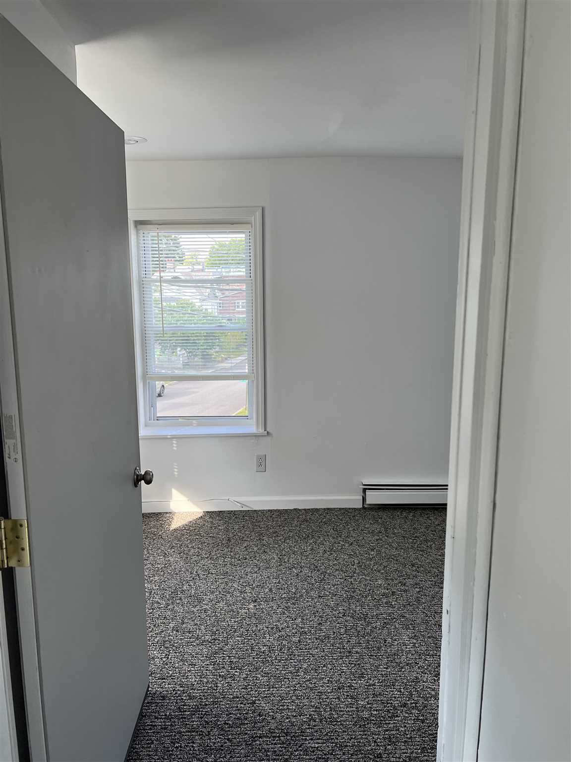 1 Dewindt Street Beacon, NY 12508 - Photo 7 of 12 an empty room with a window